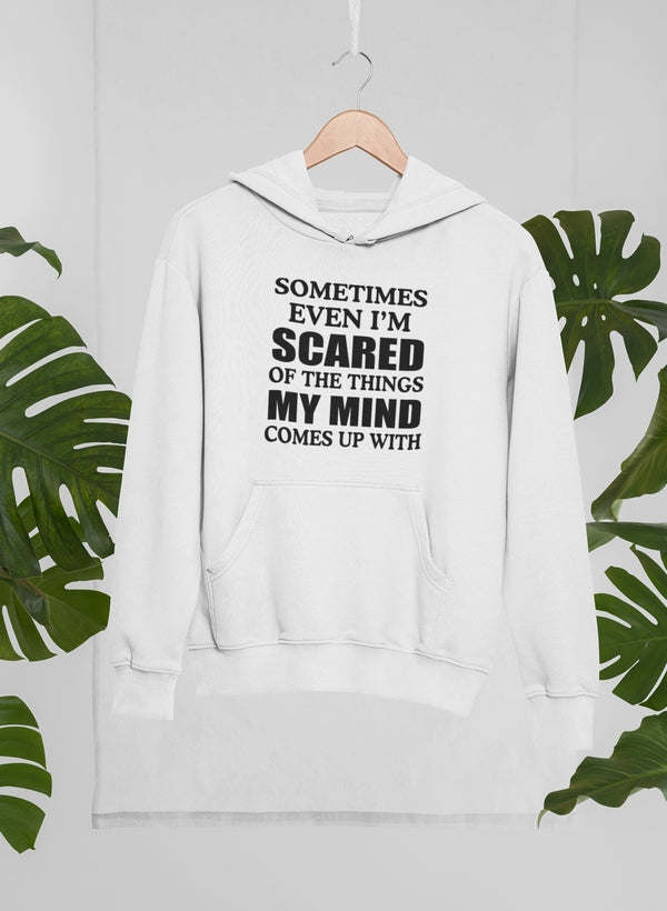 White hoodie with “Sometimes even I’m scared...” text graphic and front pocket