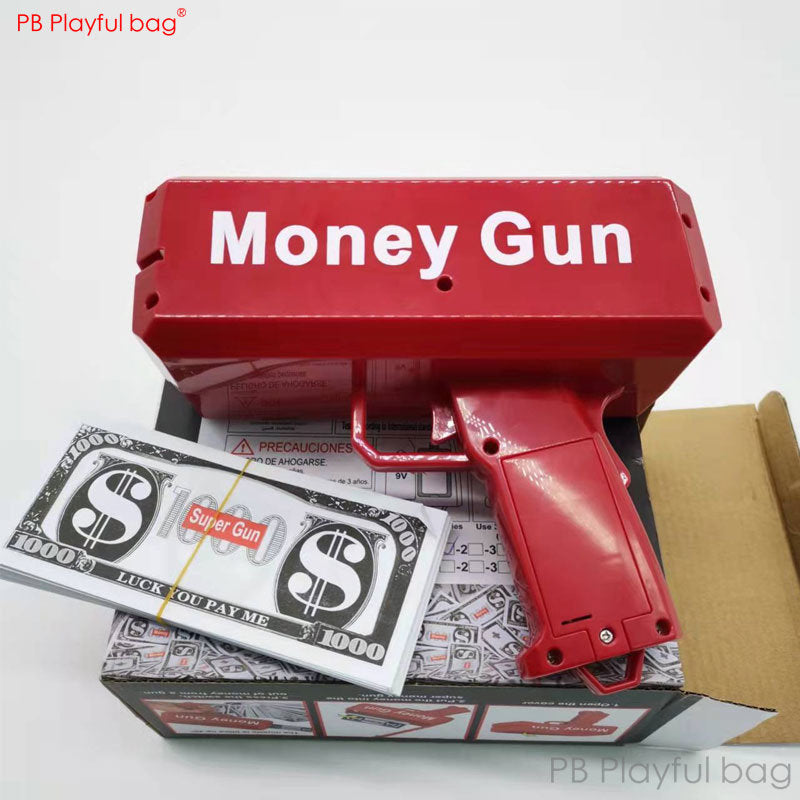 Red plastic money gun toy with “Money Gun” label, shown with prop cash