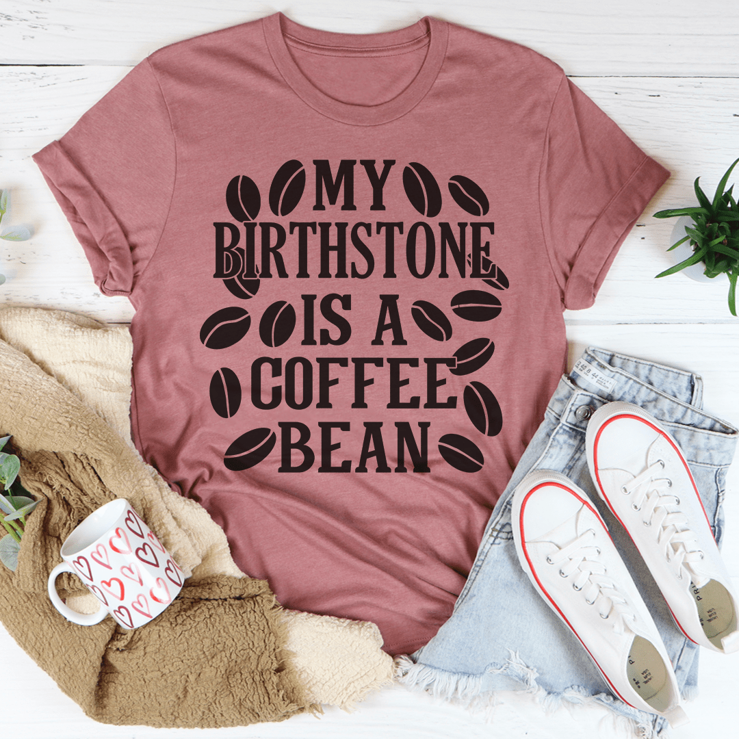Mauve T-shirt with black coffee bean graphic and text design, crew neck short sleeves