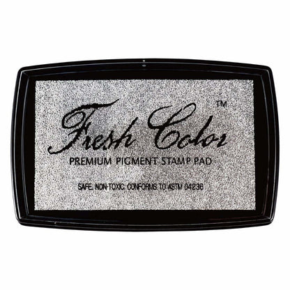 Silver pigment stamp pad in black case, speckled ink pad with 'Fresh Color' print.