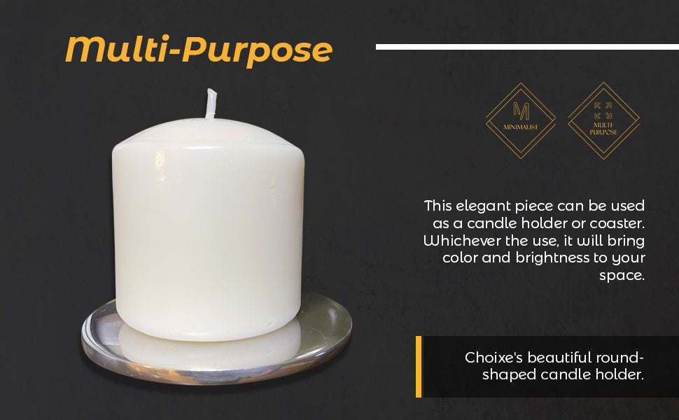 White pillar candle on round candle holder/coaster