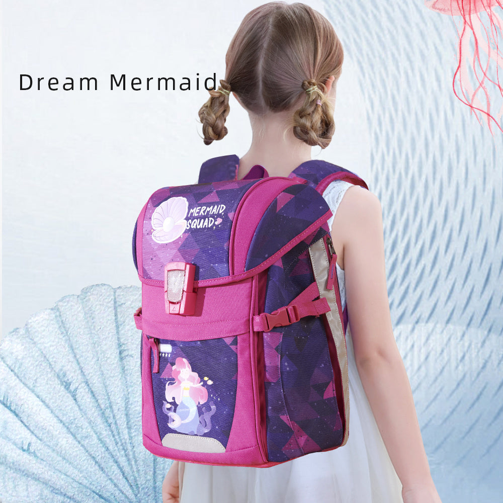 Children's pink school backpack worn by child, mermaid front design