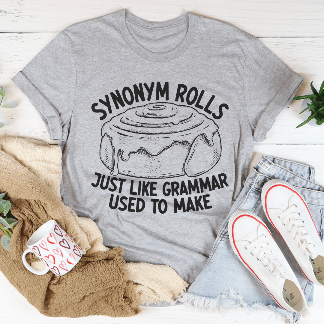 Heather gray graphic T-shirt with “Synonym Rolls” text and “just like grammar” slogan