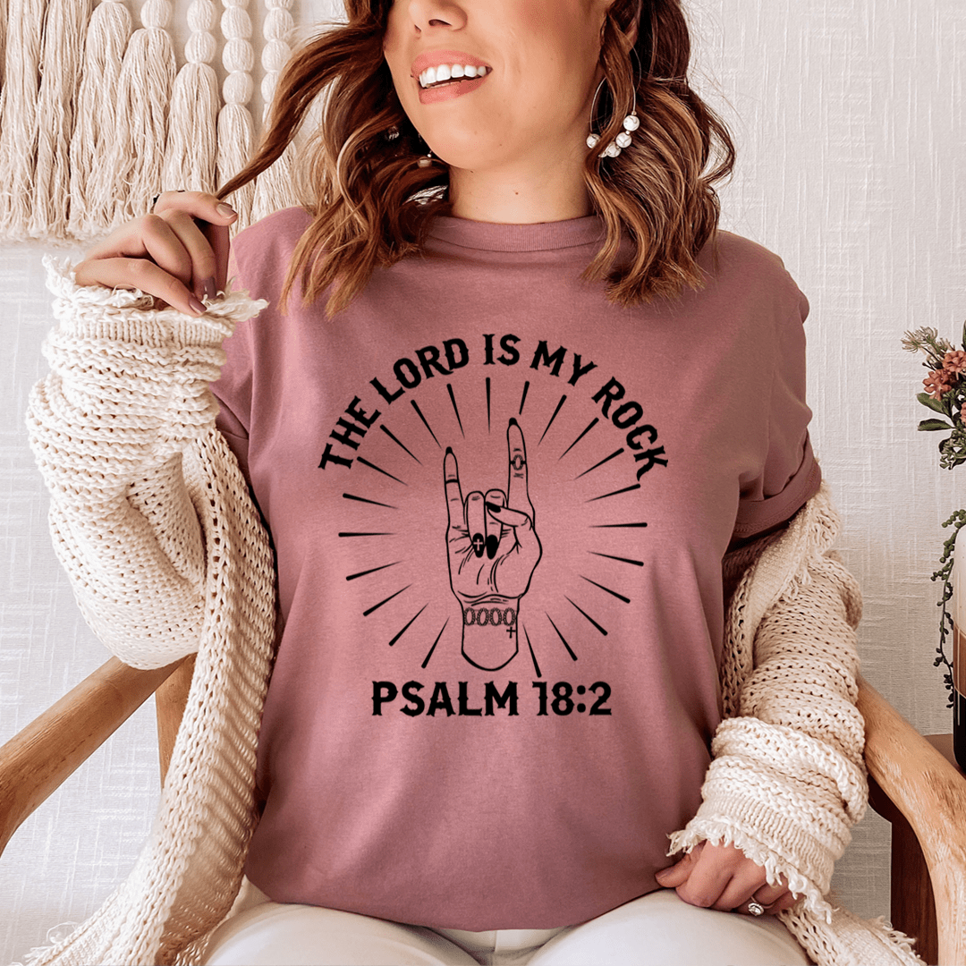 Mauve crewneck T-shirt with centered peace hand graphic and Psalm 18:2