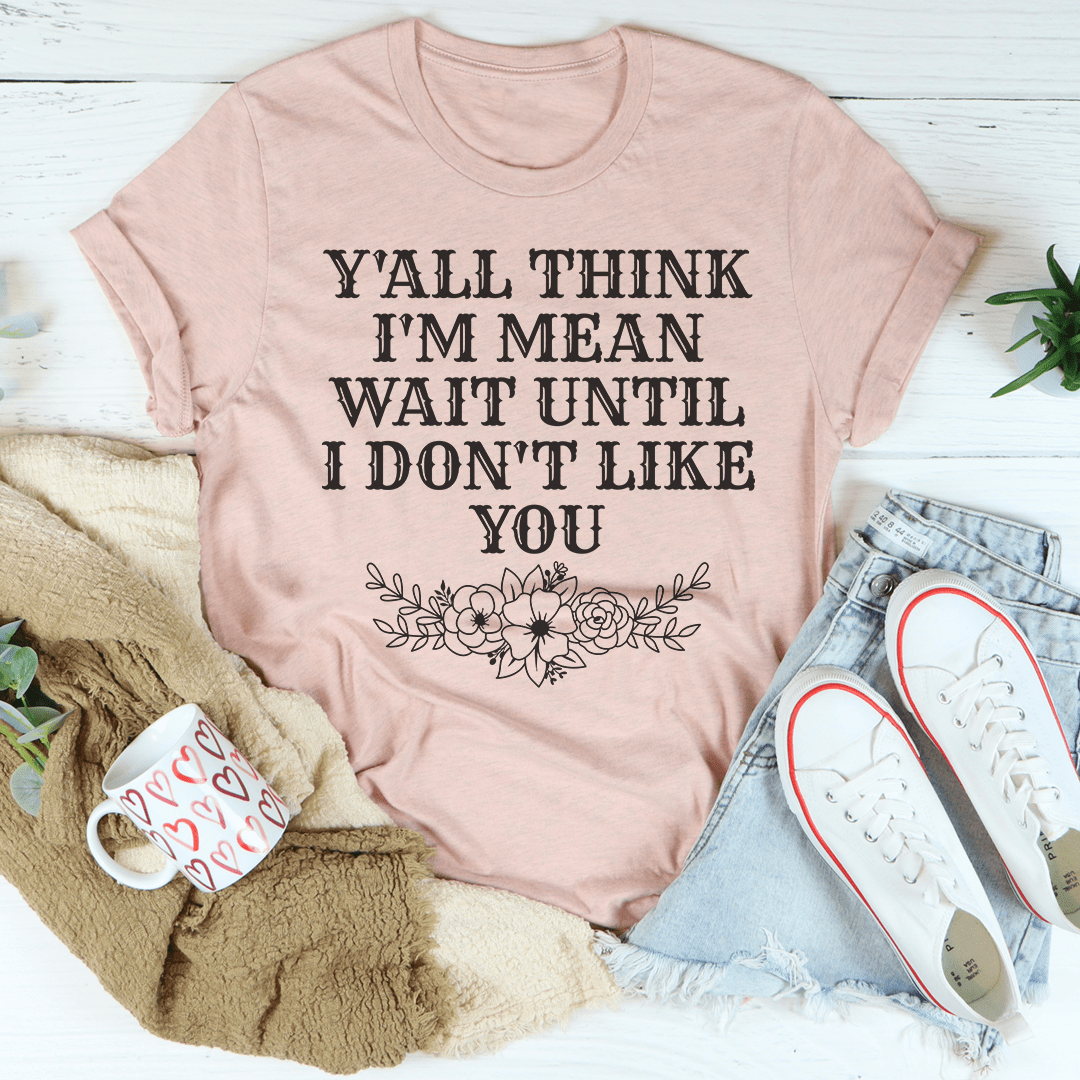 Mauve crewneck T-shirt with “Y’ALL THINK I’M MEAN” graphic and floral design