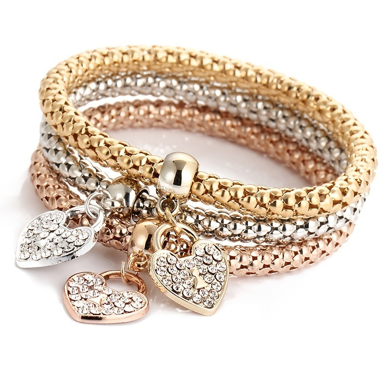 Multicolor rhinestone heart charm bracelet with three stacked chain wraps
