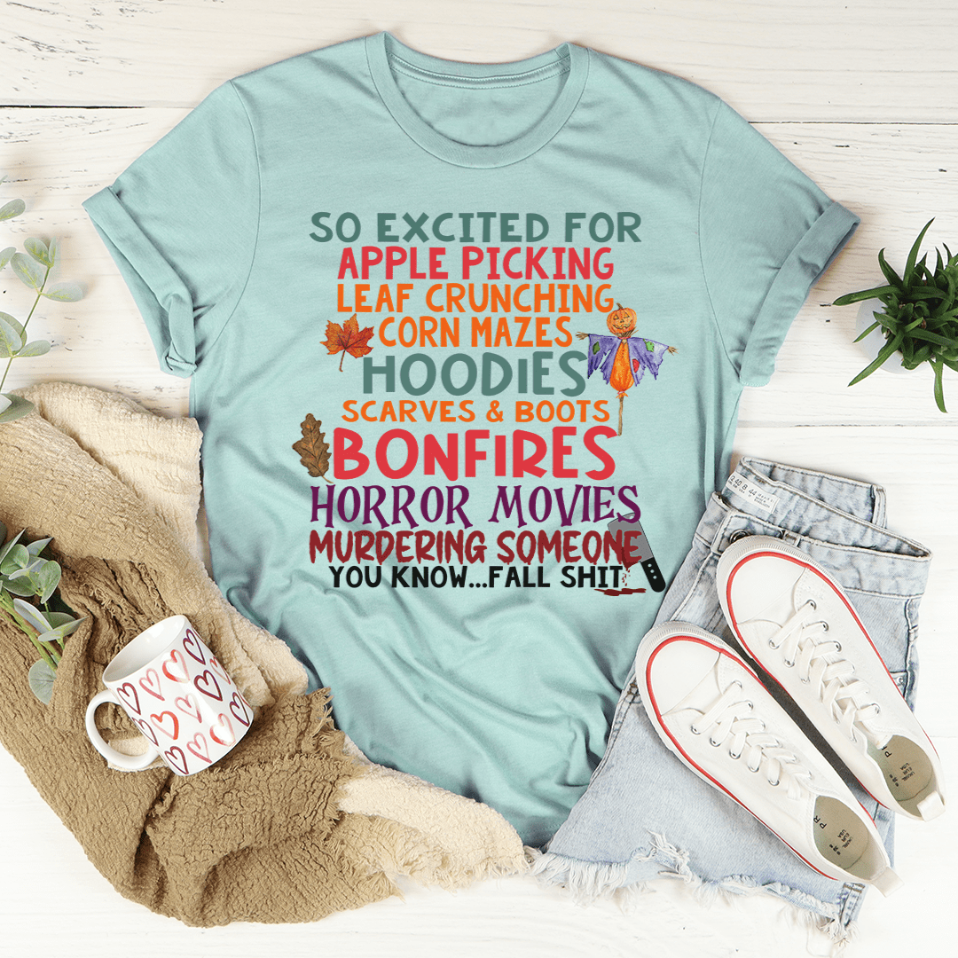 Teal T-shirt with colorful fall-themed graphic lettering across the front