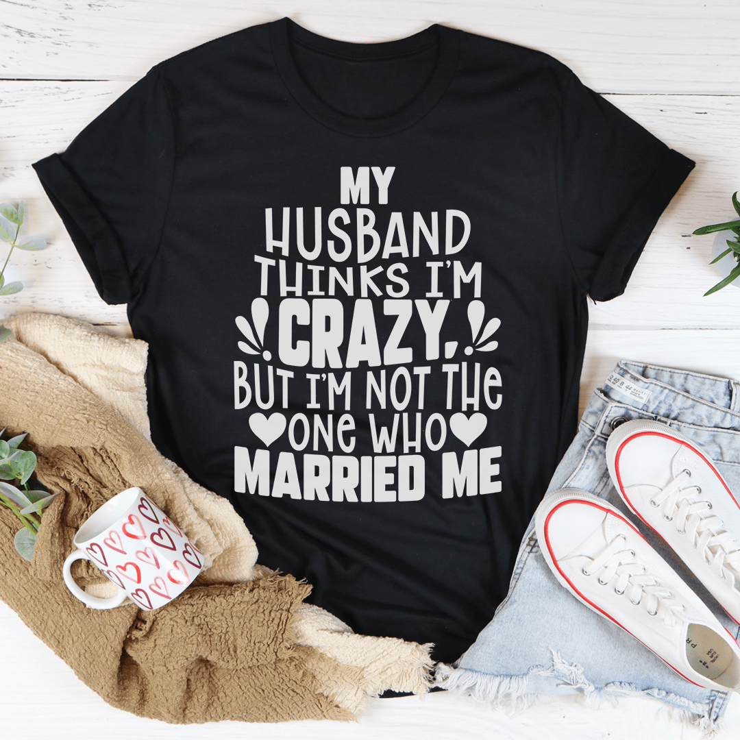 Black T-shirt with bold "My Husband Thinks I'm Crazy" graphic and heart accents