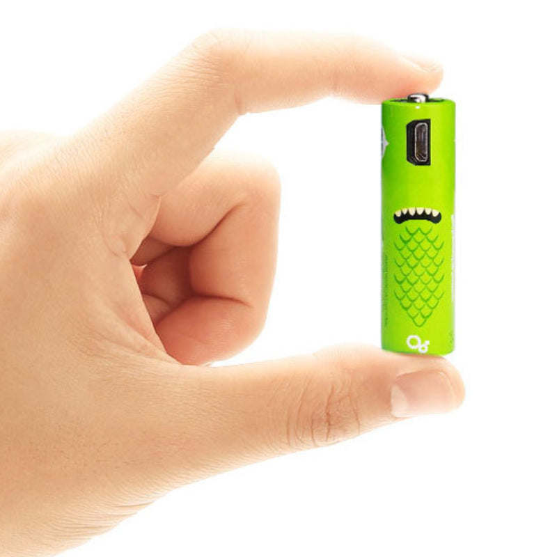 Green rechargeable battery held in hand with charging port on top