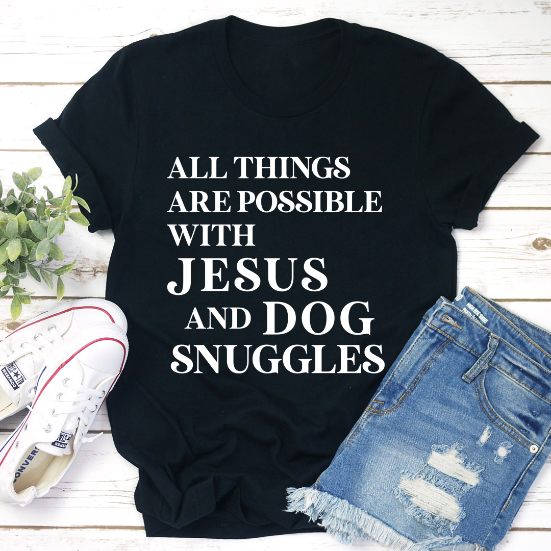 Black crewneck T-shirt featuring “All things are possible with Jesus and dog snuggles”