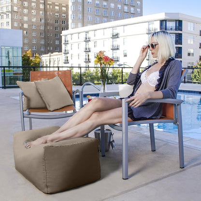 Taupe outdoor bean bag ottoman with boxy shape and stitched fabric