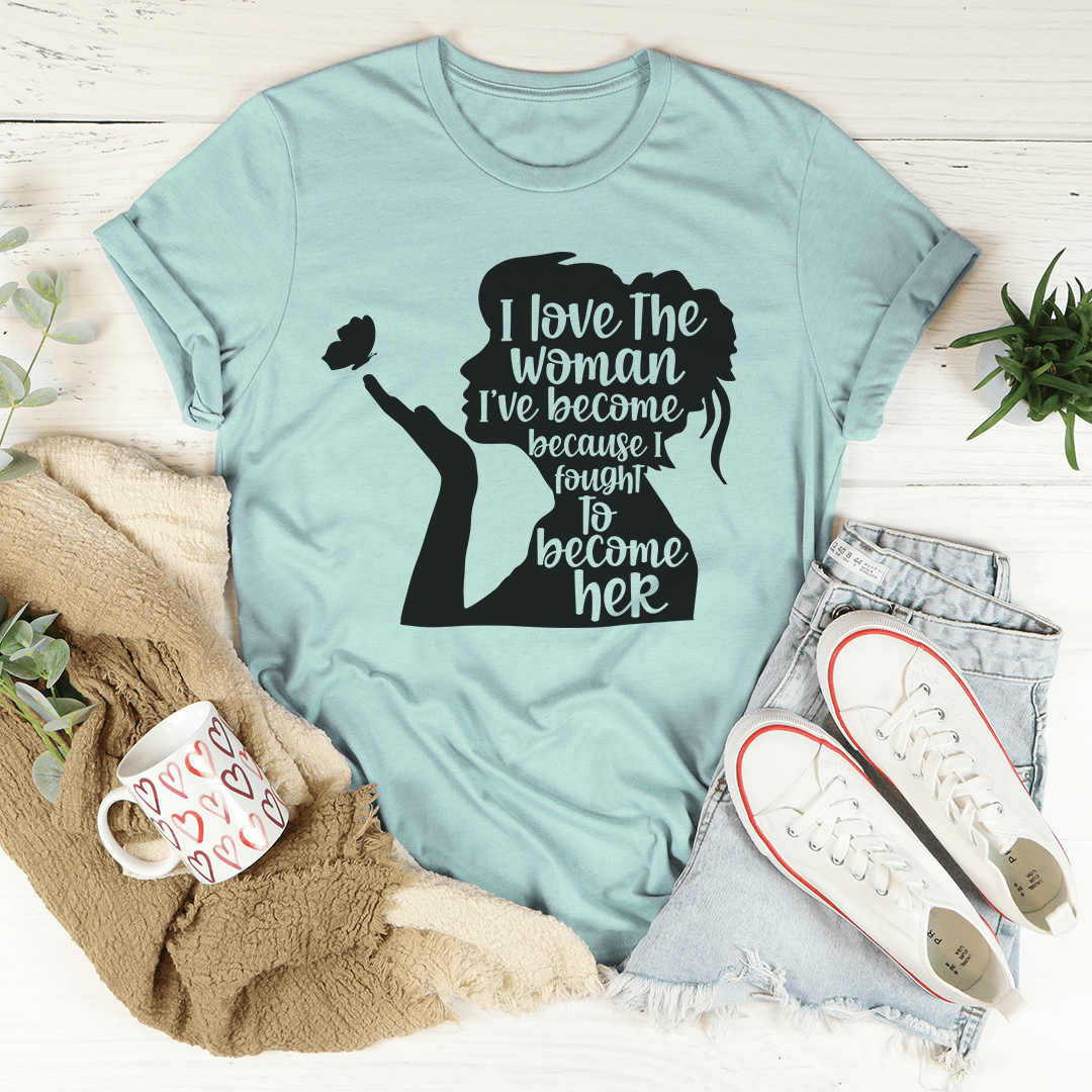 Dusty blue women's t-shirt with black woman silhouette and stacked quote graphic