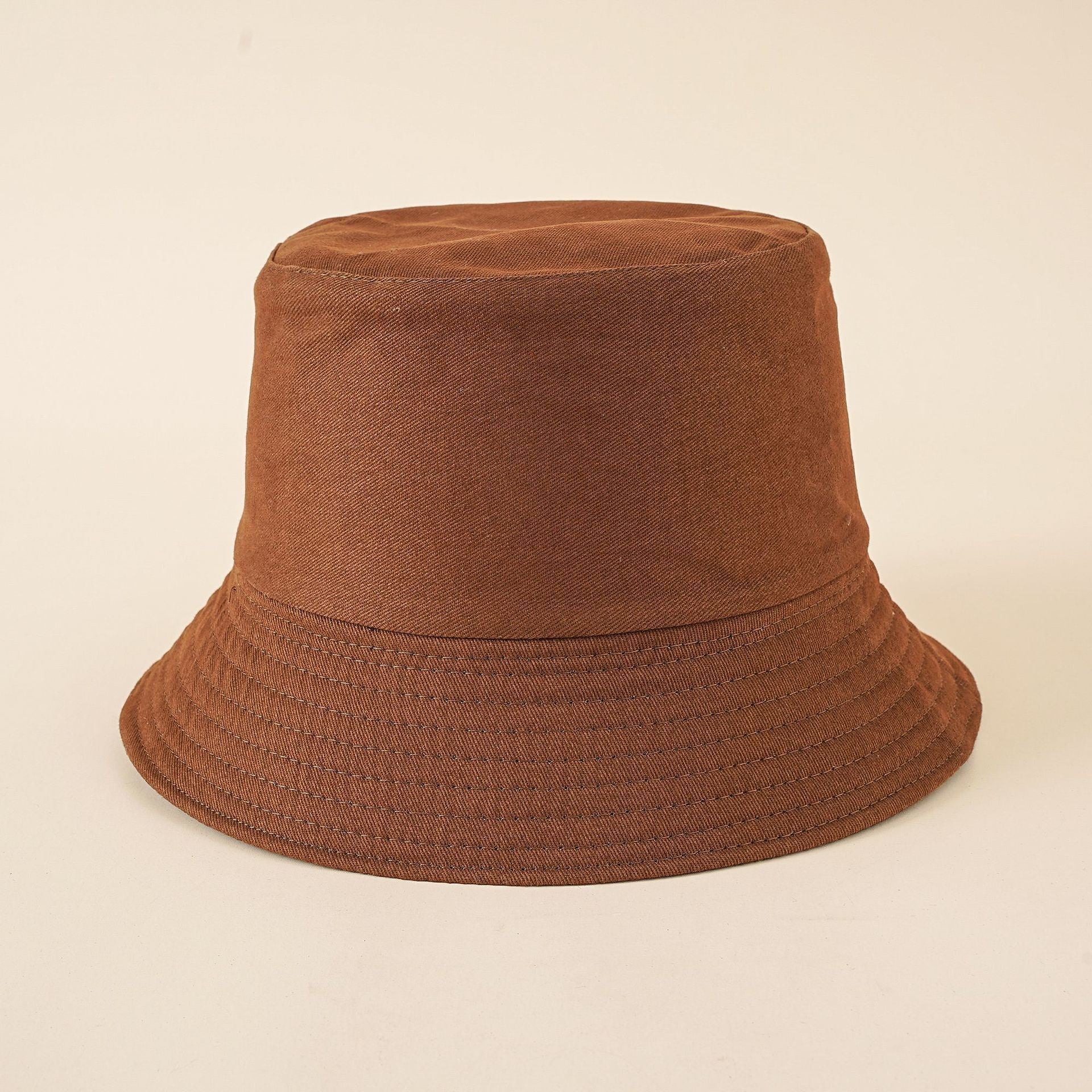 Dark brown women's fisherman bucket hat with stitched eyelet band