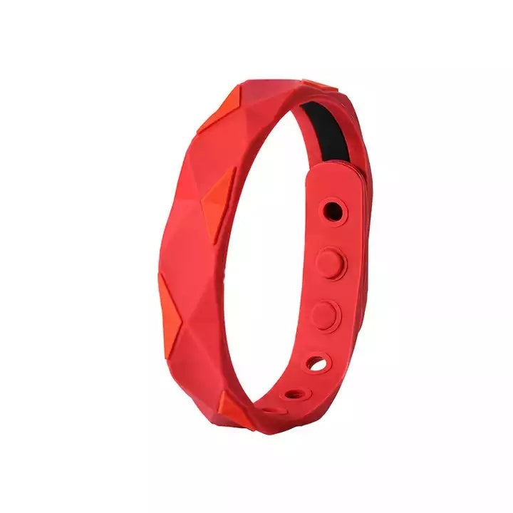 Anti-static bracelet in red silicone with textured pattern and adjustable hole slots