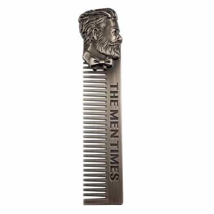 Stainless steel pocket comb with fine teeth and engraved lion-face handle, dark metallic