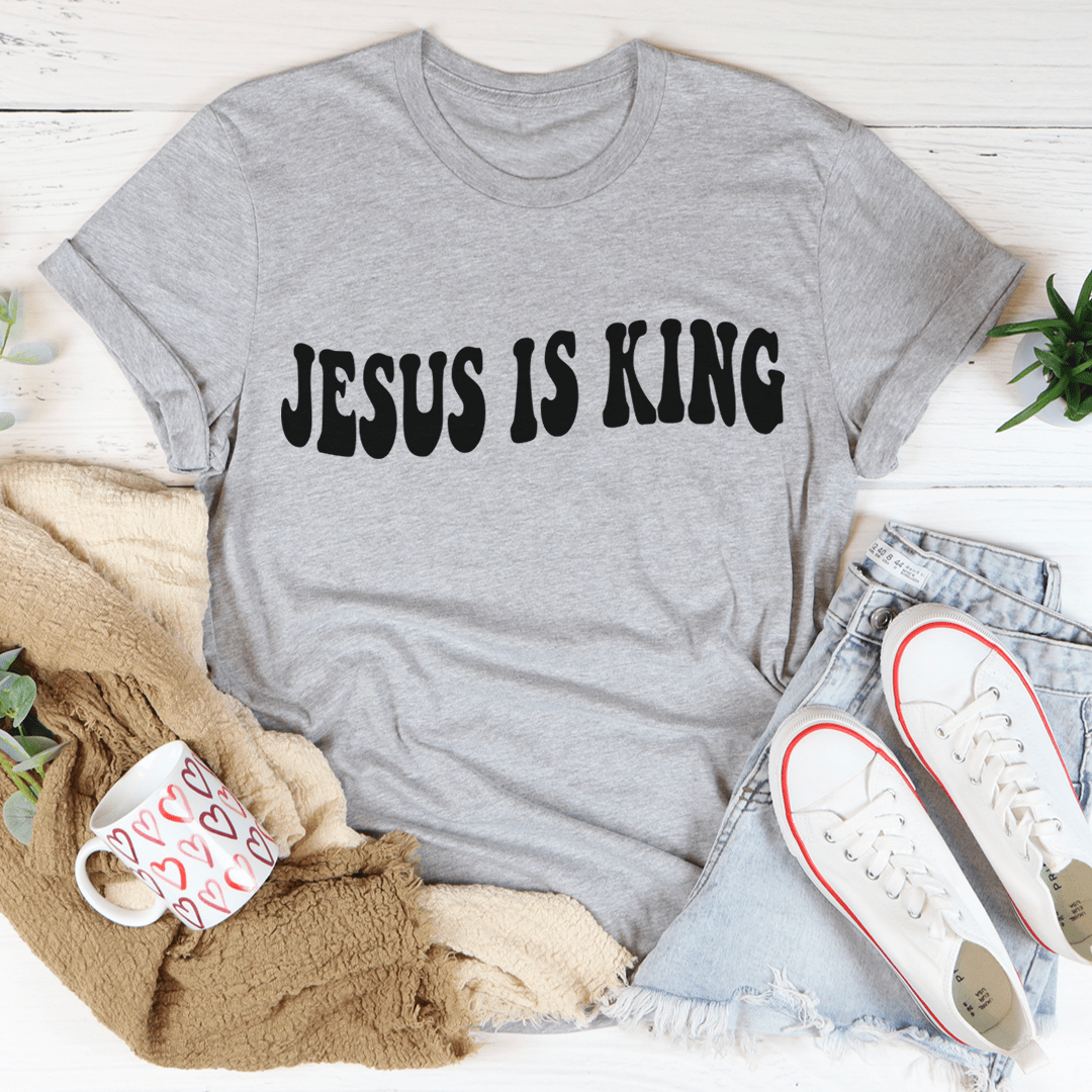 Gray short-sleeve T-shirt with black "JESUS IS KING" front graphic.