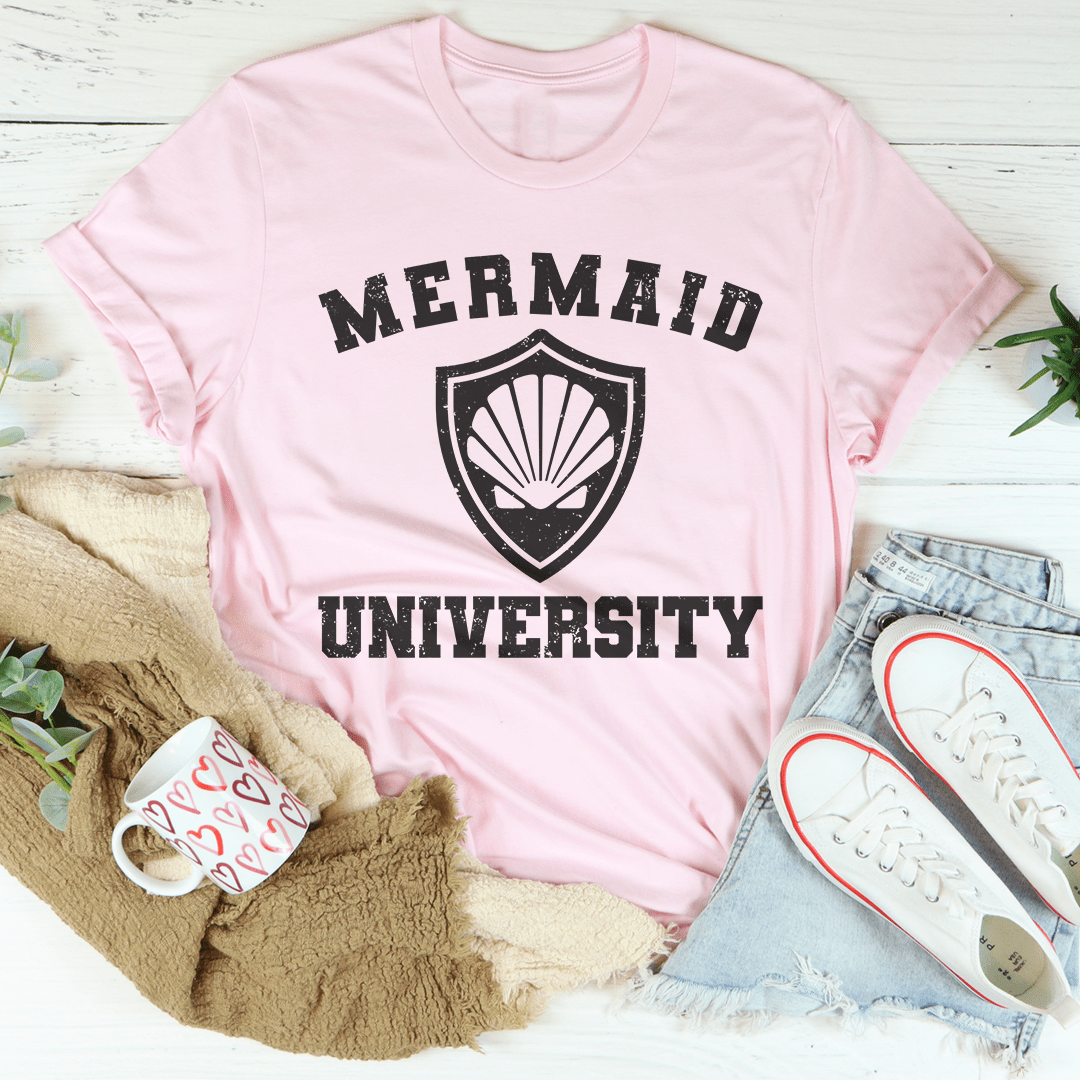 Pink T-shirt with Mermaid shield emblem and "MERMAID UNIVERSITY" lettering