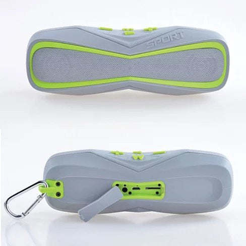 Waterproof Bluetooth speaker in gray with neon green trim and clip ring