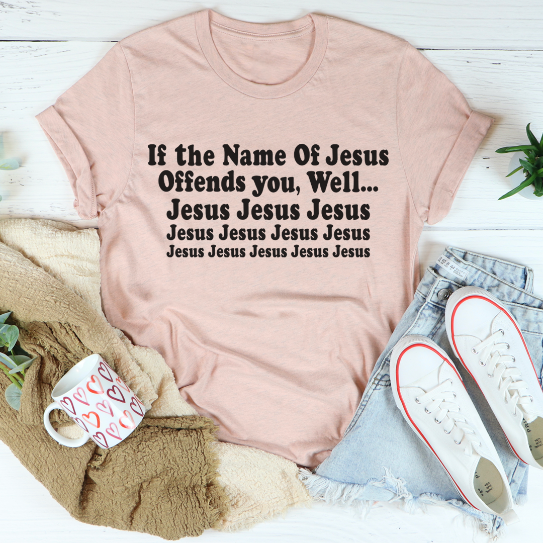 Mauve T-shirt with front text: “If the Name Of Jesus Offends you, Well…” and repeated Jesus