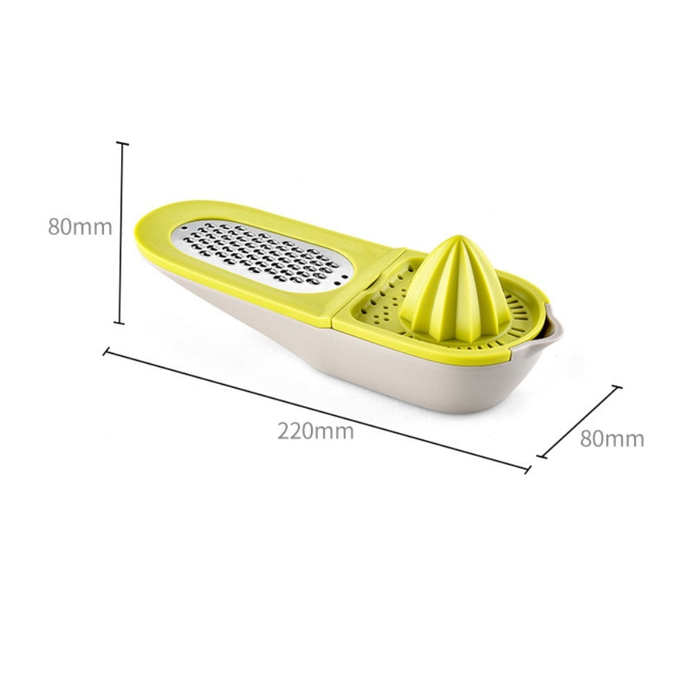 Green citrus juicer and grater with size markings, cone reamer and grater insert