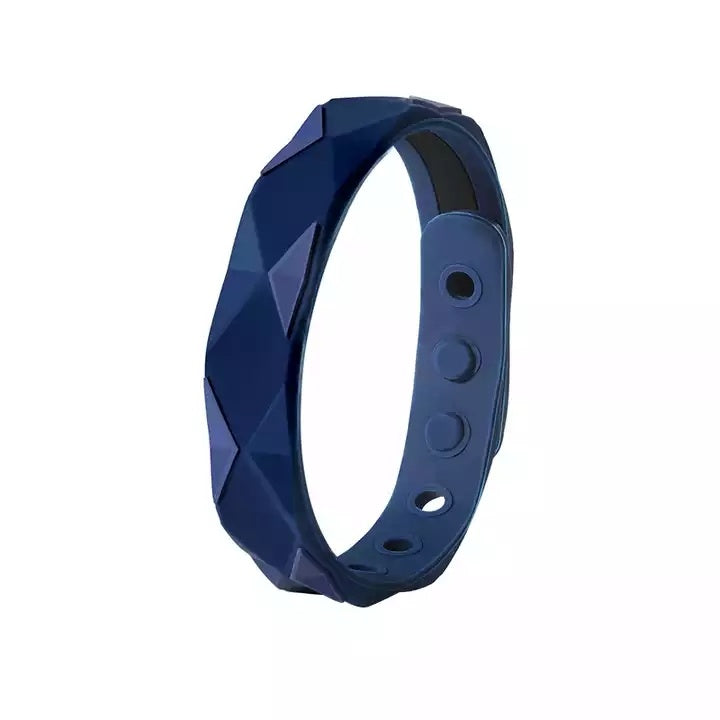 Anti-static bracelet in blue silicone with textured pattern and adjustable hole slots