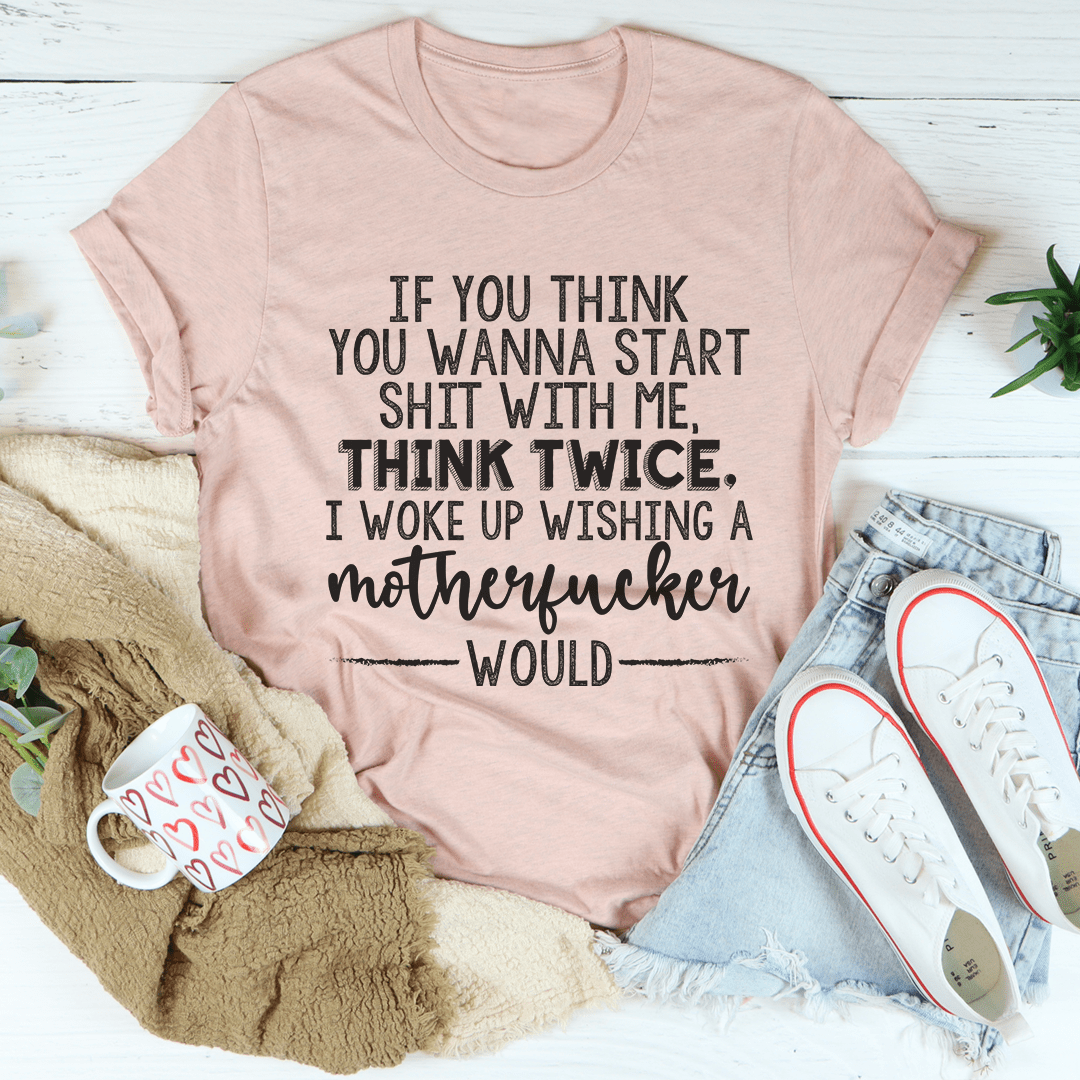 Mauve crew-neck T-shirt with bold “Think Twice” graphic slogan front