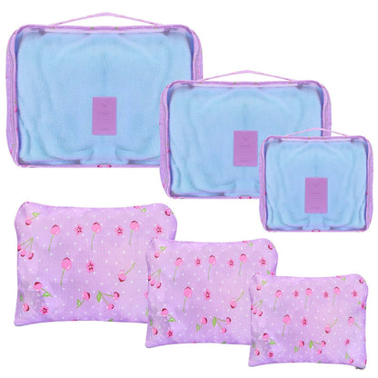 Light blue travel packing cubes with purple trim and matching zip pouches set
