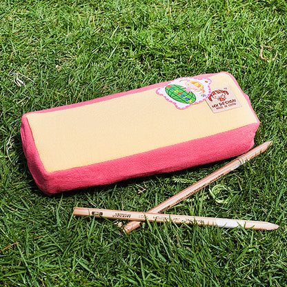 Embroidered pencil pouch, flat back view, pink and beige panel with cute patch emblem