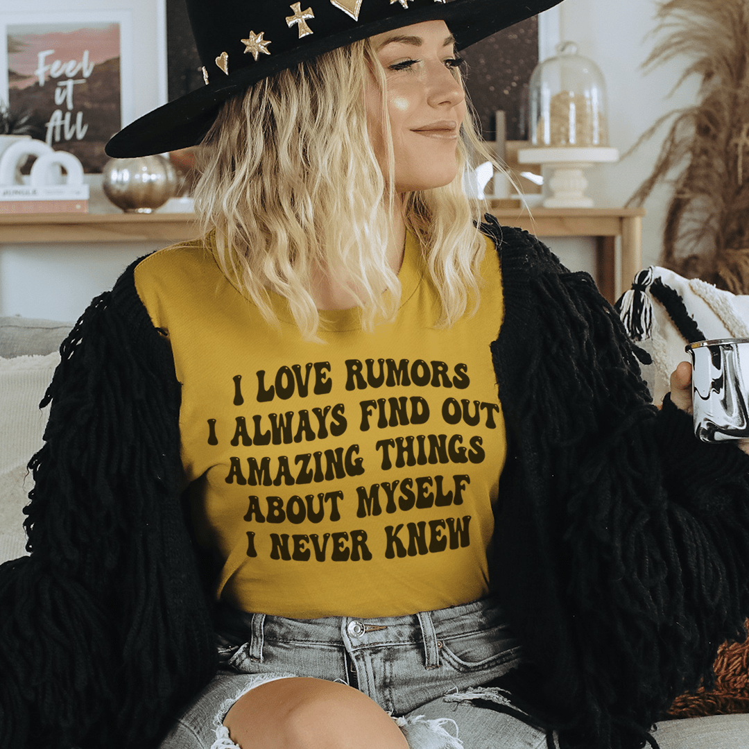Mustard yellow crewneck T-shirt with bold black quote graphic on front