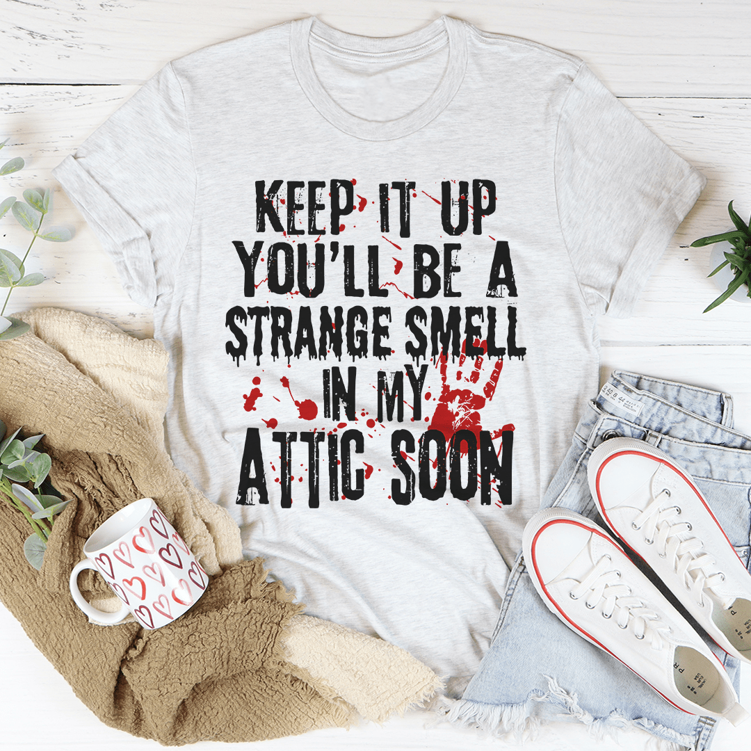 Light gray short-sleeve T-shirt with bold black and red attic graphic on front