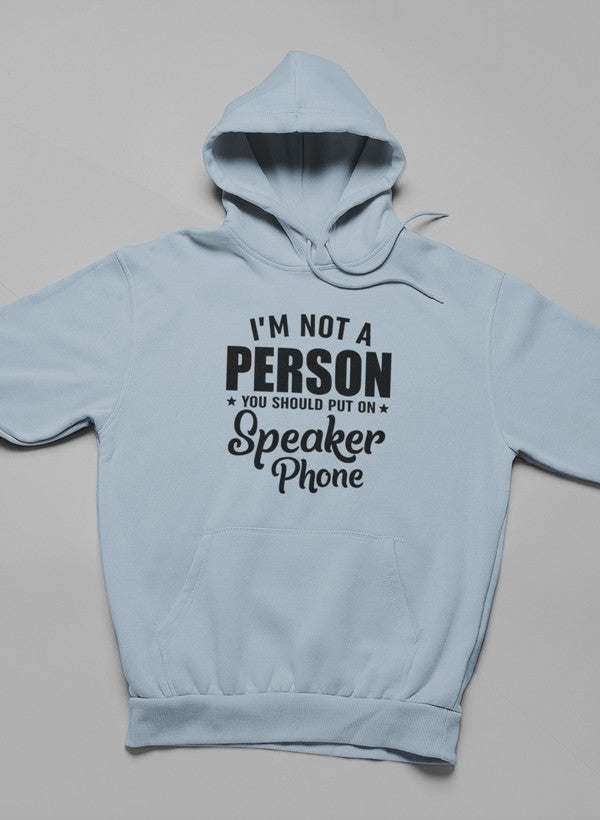 Light blue pullover hoodie with front text graphic "I'm Not a Person" "Speaker Phone"
