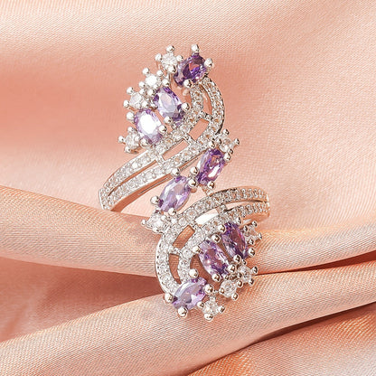 Amethyst zircon stack ring with three purple oval clusters and pavé silver bands