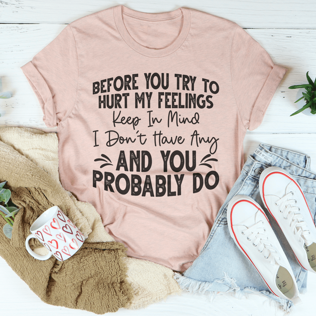 Mauve T-shirt with printed “Before you try to hurt my feelings” quote graphic