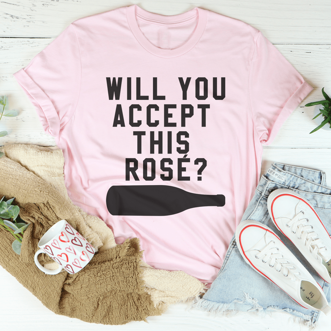 Light pink rose T-shirt, crew neck, with bold black "WILL YOU ACCEPT THIS ROSE?" text