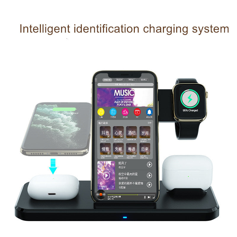 Black wireless charging dock with phone, smartwatch, and two wireless earbuds