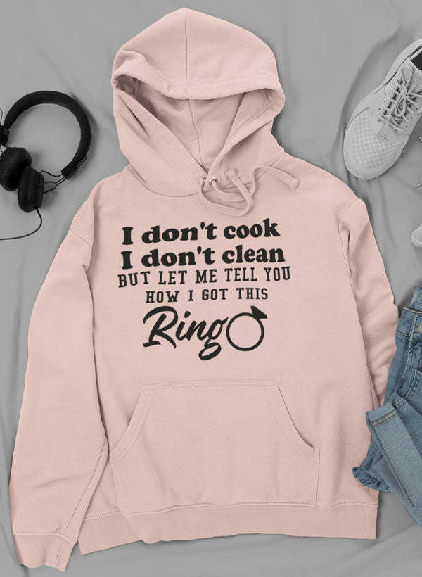Light mauve hoodie with front text graphic and drawstring hood