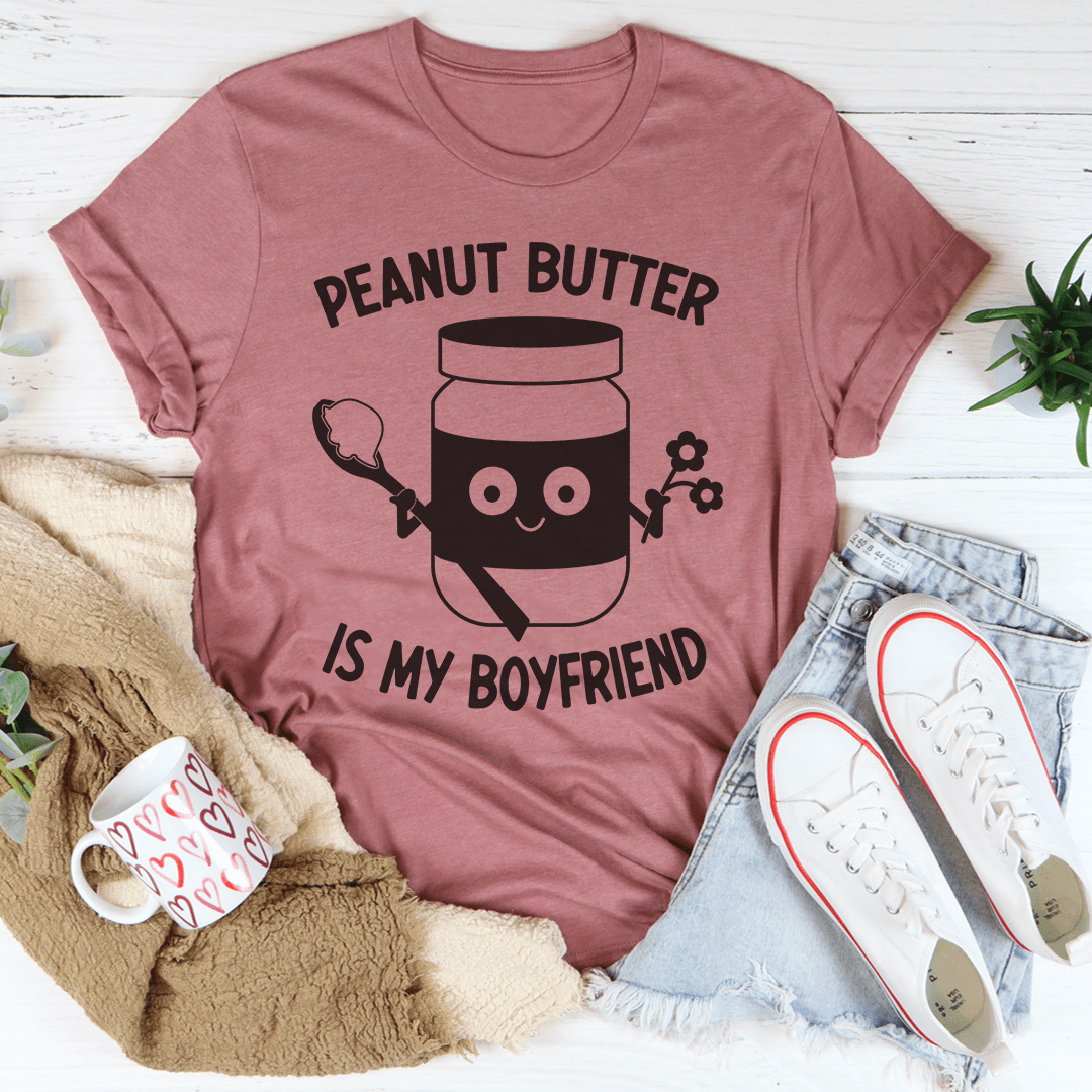 Mauve T-shirt with black 'Peanut Butter is my boyfriend' text and character illustration.