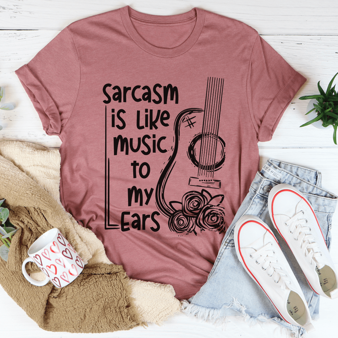 Mauve crew-neck T-shirt with black music and ears graphic