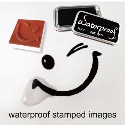 Black waterproof ink pad with inked stamp sample