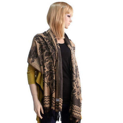 Floral pashmina shawl draped on model in khaki and dark brown with fringe trim