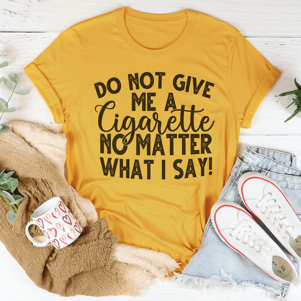 Mustard short-sleeve crew-neck T-shirt featuring cigarette warning slogan graphic