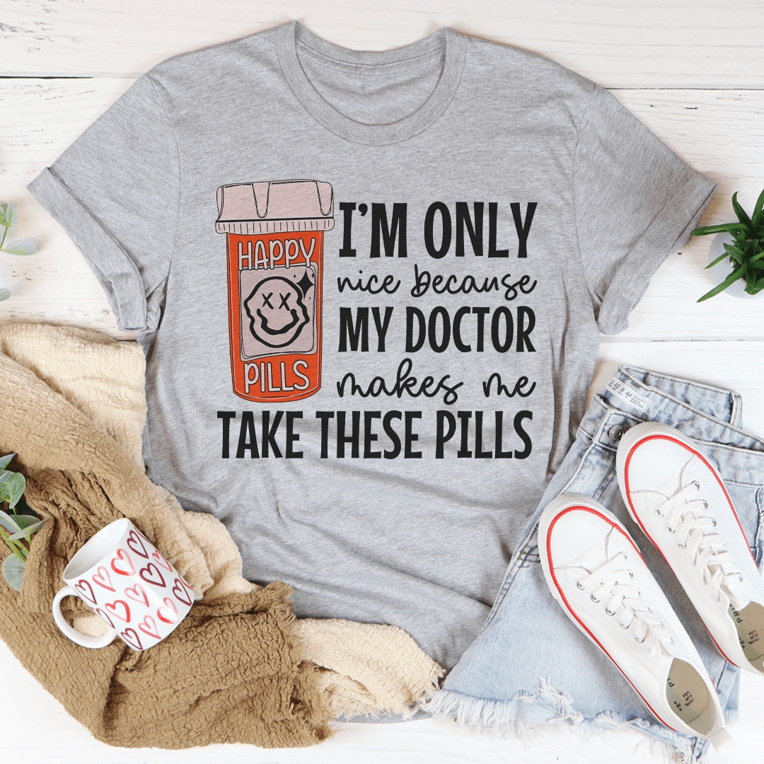 Gray Happy Pills graphic T-shirt with pill-themed “I’m only nice because my doctor” centered print
