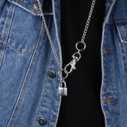 Silver-tone long chain necklace with carabiner lock charm and padlock pendant