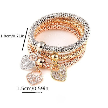 Multicolor rhinestone heart charm bracelet with four heart pendants