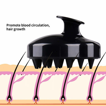 Black scalp massage brush head with pointed spikes on scalp