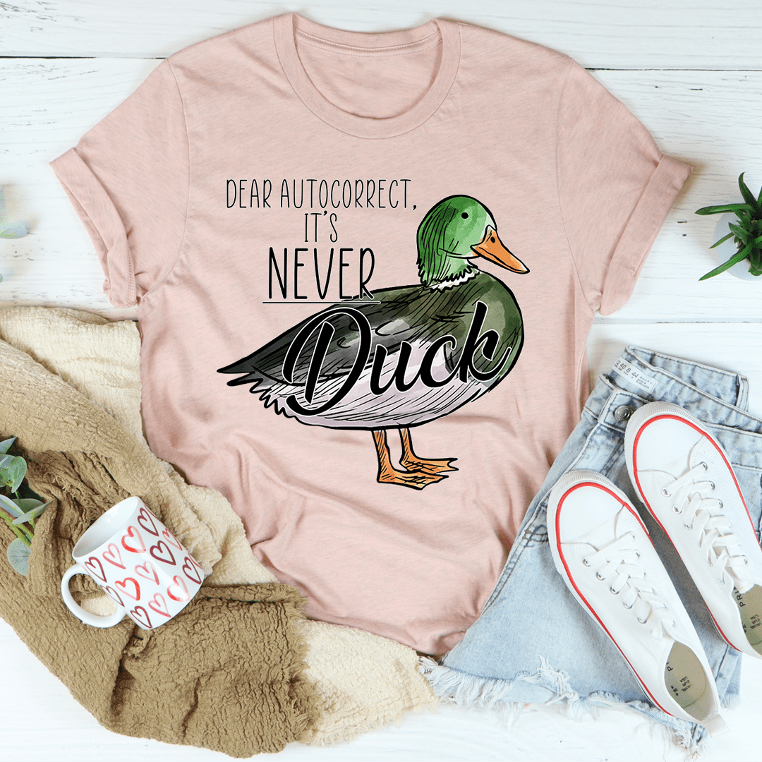 Mauve short-sleeve T-shirt with 'It's Never' text and green duck graphic