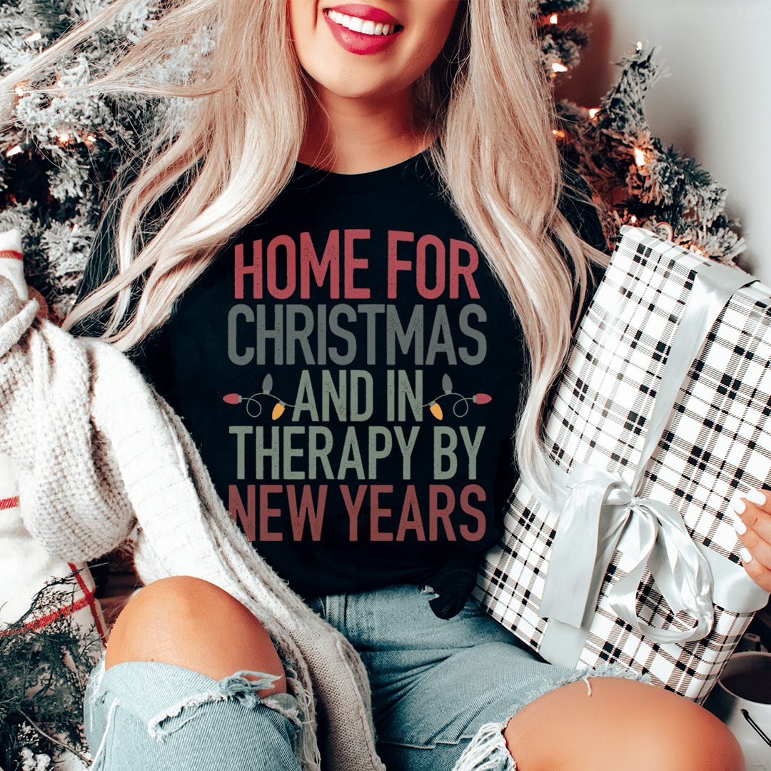 Black crewneck graphic T-shirt with holiday slogan text