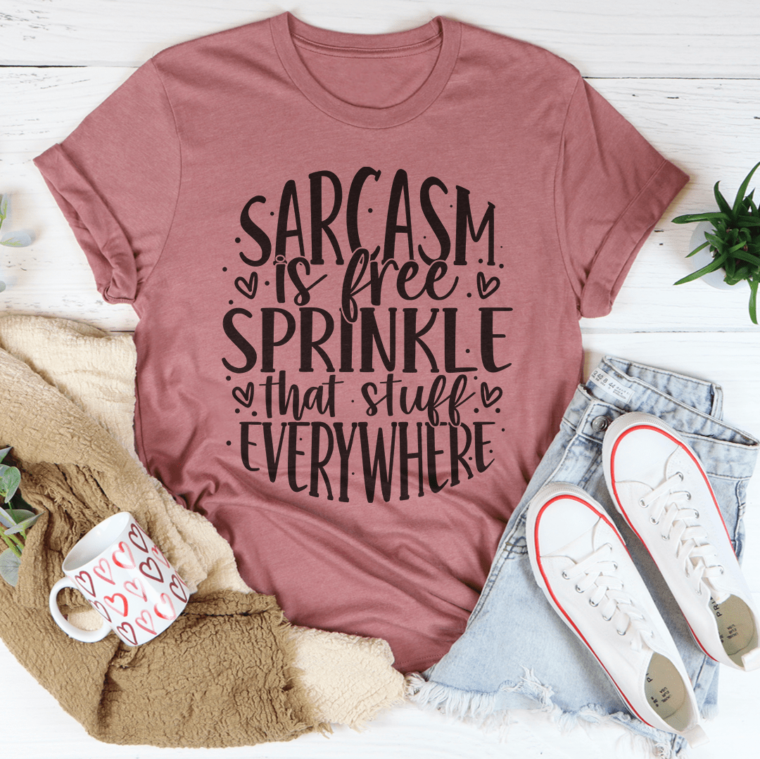 Dusty pink T-shirt with large black 'Sarcasm is free' typographic graphic