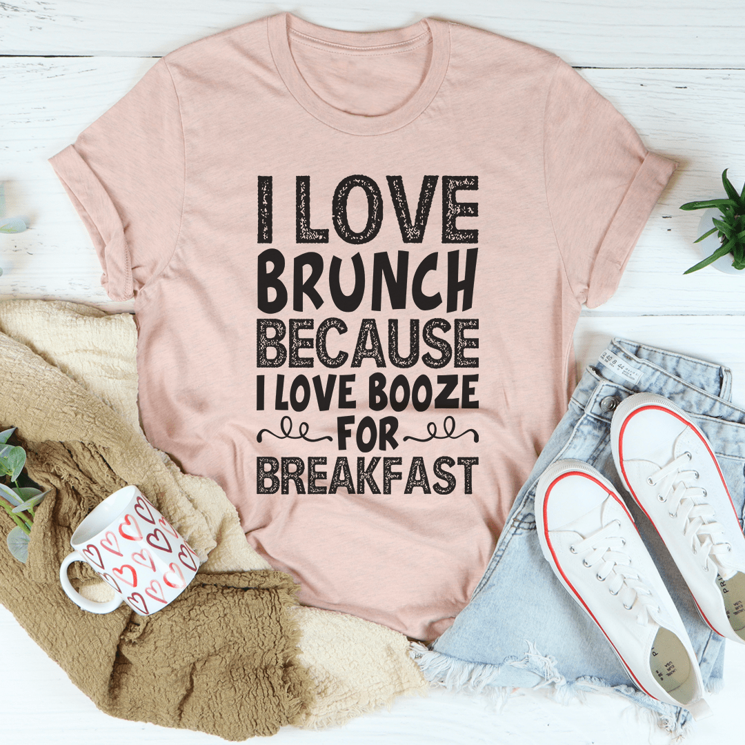 Light mauve short-sleeve T-shirt with "I LOVE BRUNCH BECAUSE" typographic graphic
