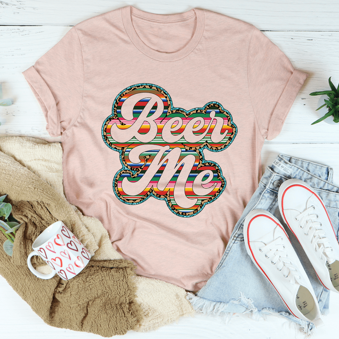 Dusty pink T-shirt, crew neck, featuring a 'Beer Me' colorful front graphic